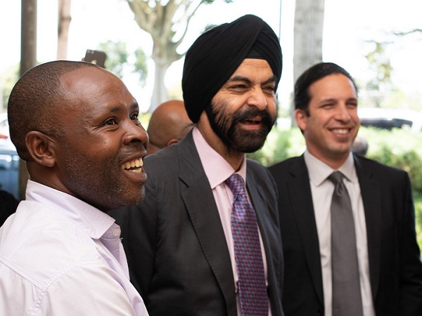Ajay Banga visiting small shop to witness pay-as-you-go QR transaction