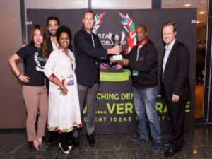 AbdulAziz Mohammed being handed his trophy. Image sourced from SA Innovation Summit.