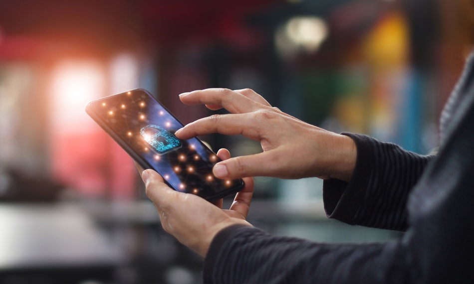Human touching technology global networking security information safety and encryption with key padlock icon on virtual screen smartphone , Data protection and cyber security network concept.