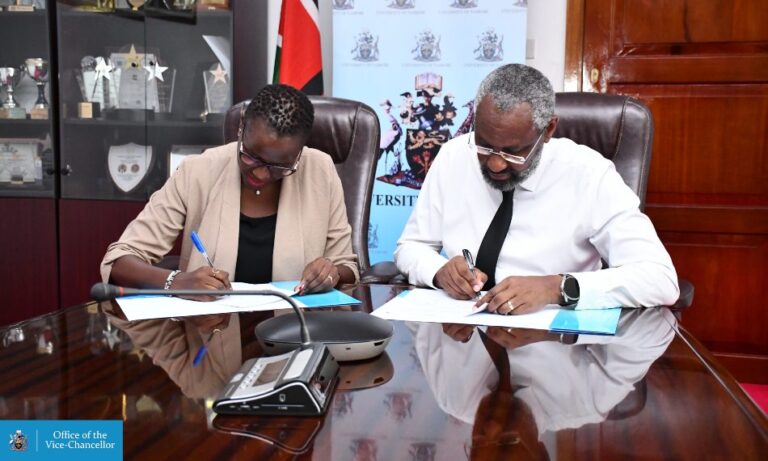 Annepeace Alwala - Vice President - Global Service Delivery at Sama (Left) and Prof. Stephen Kiama, Vice-Chancellor of the University of Nairobi (Right) signing a partnership designed to advance the Generative AI (GenAI) industry in Kenya.